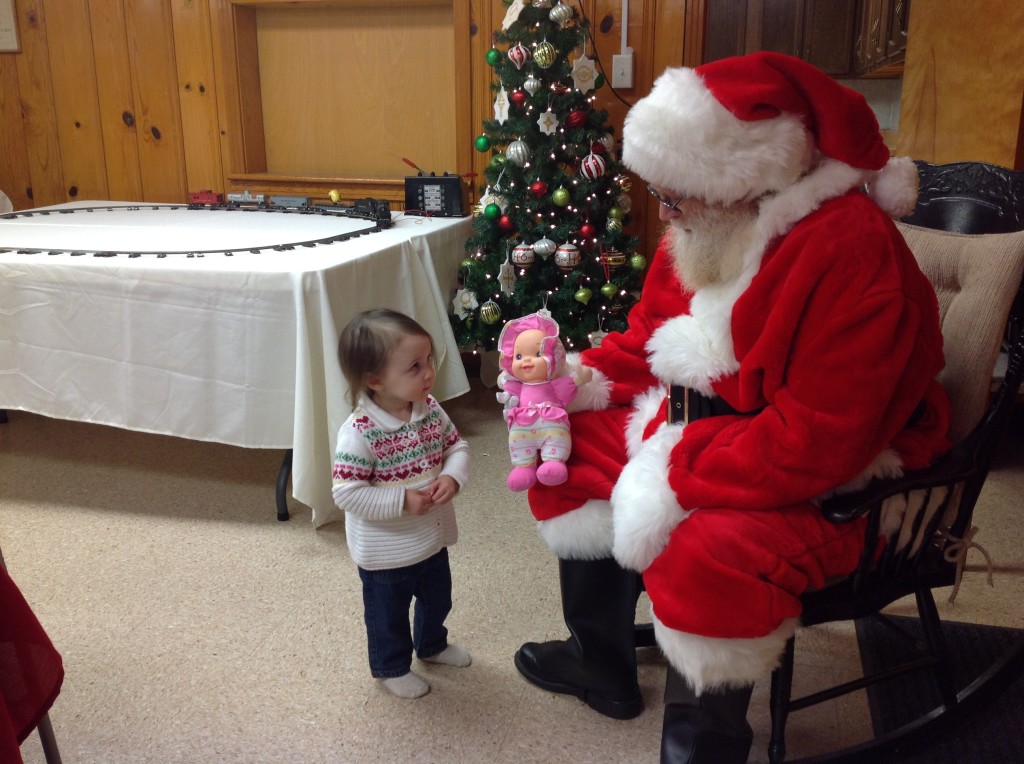 Showing Santa Her Gift